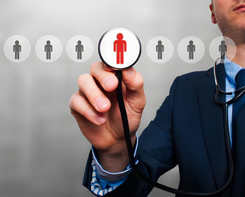 Businessman hand with stethoscope